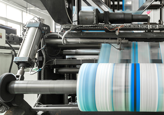 The machine is in operation to produce flexible packaging films